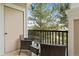 Relaxing balcony featuring outdoor seating with a scenic view of trees and greenery, perfect for unwinding at 2169 Eagle Ave # 2169, Superior, CO 80027