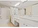 Bright bathroom featuring a double vanity, shower-tub combination and neutral walls at 2169 Eagle Ave # 2169, Superior, CO 80027