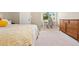 Cozy bedroom featuring carpet floors, neutral paint, and bright natural light at 2169 Eagle Ave # 2169, Superior, CO 80027