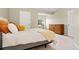 Light-filled bedroom with carpeted floors, desk with natural light, and neutral paint at 2169 Eagle Ave # 2169, Superior, CO 80027