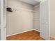 Walk-in closet with ample shelving and wooden floor at 2169 Eagle Ave # 2169, Superior, CO 80027