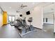 Community fitness center with cardio machines, mounted TVs, and ceiling fans at 2169 Eagle Ave # 2169, Superior, CO 80027