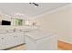 Open-concept kitchen with modern appliances, a center island, and seamless transition to the living space at 2169 Eagle Ave # 2169, Superior, CO 80027