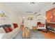 Comfortable living area with ample seating, a decorative rug, and a view into the kitchen area at 2169 Eagle Ave # 2169, Superior, CO 80027
