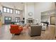 Spacious community living room featuring high ceilings, a fireplace and comfortable seating at 2169 Eagle Ave # 2169, Superior, CO 80027