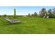 Relaxing lounge area on a lush green lawn with seating and umbrellas providing shade at 2169 Eagle Ave # 2169, Superior, CO 80027
