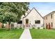 Charming home featuring a well-manicured lawn, a walkway, and a decorative fence with outdoor seating at 659 Albion St, Denver, CO 80220