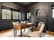 Chic home office featuring a wood desk, comfortable seating, and ample natural light at 659 Albion St, Denver, CO 80220