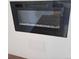 Modern electric fireplace with crystal accents set into the wall of the house at 1304 S Parker Rd # 13, Denver, CO 80231