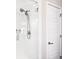 Modern shower with white tile and glass enclosure at 5965 Hanover St, Denver, CO 80238