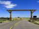Entrance to Rocky Mountain Arsenal National Wildlife Refuge with a bicycle and a sign at 5965 Hanover St, Denver, CO 80238