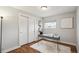 Well-lit office with hardwood floors, a neutral color palette, and a modern desk at 7049 W 74Th Ave, Arvada, CO 80003