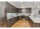 Modern kitchen with sleek cabinets, stainless steel appliances, and bright countertops at 3408 W 18Th Ave, Denver, CO 80204