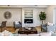 Bright living room featuring a fireplace and elegant decor at 3408 W 18Th Ave, Denver, CO 80204