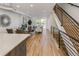 Open floor plan integrating the living and dining areas with modern railings at 3408 W 18Th Ave, Denver, CO 80204