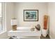 Bright office space with white desk, modern decor, and natural light at 3408 W 18Th Ave, Denver, CO 80204