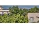 A suburban view with trees and mountains in the distance at 3408 W 18Th Ave, Denver, CO 80204