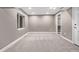 Finished basement featuring neutral walls, and carpeting at 7586 Halleys Dr, Littleton, CO 80125