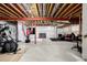 An unfinished basement featuring an exercise area and a relaxation zone at 27029 E Irish Pl, Aurora, CO 80016