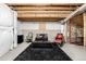 An unfinished basement provides a large recreation space for flexible use at 27029 E Irish Pl, Aurora, CO 80016