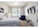 Comfortable bedroom with a ceiling fan, chair and light-filtering curtains for a relaxing space at 27029 E Irish Pl, Aurora, CO 80016