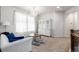 Living room with a chandelier, white furniture, and a display cabinet at 27029 E Irish Pl, Aurora, CO 80016