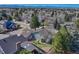 Aerial view of the property, showcasing the backyard, surrounding neighborhood, and proximity to community amenities at 7444 S Milwaukee Ct, Centennial, CO 80122