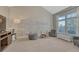 Bright and spacious bedroom with high ceilings, a large window, and ample natural light at 7444 S Milwaukee Ct, Centennial, CO 80122