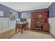 Inviting home office featuring a large desk, ample storage, and neutral decor at 7444 S Milwaukee Ct, Centennial, CO 80122