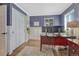 Well-lit home office with ample storage, a spacious desk, and neutral decor at 7444 S Milwaukee Ct, Centennial, CO 80122