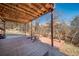 Outdoor back deck offering stunning natural views and a relaxing atmosphere at 6601 Pike Cir, Larkspur, CO 80118