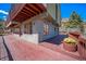 Spacious deck offering outdoor living space and views of the mountains and rock formations at 6601 Pike Cir, Larkspur, CO 80118