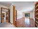The bonus room has a decorative bookcase, a sliding glass door to the exterior, and tile flooring at 6601 Pike Cir, Larkspur, CO 80118