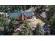 Aerial view showcasing the house's outdoor seating and nearby hot tub at 804 Clear Creek Rd, Evergreen, CO 80439