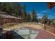 Backyard with outdoor seating area and mountain views at 804 Clear Creek Rd, Evergreen, CO 80439