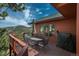 Deck with outdoor seating and mountain views at 804 Clear Creek Rd, Evergreen, CO 80439