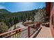 Spacious deck offers scenic views of the surrounding natural landscape at 804 Clear Creek Rd, Evergreen, CO 80439