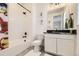 Charming bathroom with superhero-themed decor and a tub at 6506 Barnstead Dr, Castle Pines, CO 80108