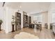 Home office with built-in shelves and a large desk at 6506 Barnstead Dr, Castle Pines, CO 80108