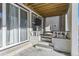 Covered patio with steps and a built-in seating area at 6506 Barnstead Dr, Castle Pines, CO 80108