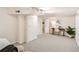 Bright basement area with neutral colors, recessed lighting, desk, and ample storage space at 1218 S Josephine St, Denver, CO 80210