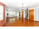 Spacious living room boasts hardwood floors and ample natural light, perfect for gatherings at 13180 Jasmine St, Thornton, CO 80602
