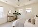 Bright bedroom featuring neutral tones, natural light, and a chandelier at 6506 Barnstead Dr, Castle Pines, CO 80108
