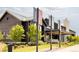 Attractive community center with modern design, landscaping, and signage promoting community engagement at 6506 Barnstead Dr, Castle Pines, CO 80108