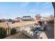 Spacious backyard with patio, grill, shed, play area, and fencing, perfect for Gathering fun and outdoor activities at 3699 S Killarney St, Aurora, CO 80013