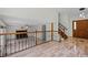 Entryway features tile floors, stairway to second floor, and transitions into living room with fireplace at 8725 Meadowlark Cir, Highlands Ranch, CO 80126