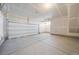 Spacious garage with concrete flooring and ample space for parking and storage, ready for customization at 22092 E 38Th Pl, Aurora, CO 80019