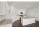 Modern kitchen features granite countertops, stainless steel appliances, and center island at 770 N Deer Park St, Watkins, CO 80137