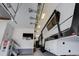 Attached garage featuring a large vehicle, storage, and access to the staircase at 6899 Petunia Pl, Castle Rock, CO 80108