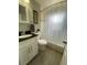 Well-maintained bathroom featuring modern fixtures and a shower-tub combo at 3993 Haddon Rd, Denver, CO 80205